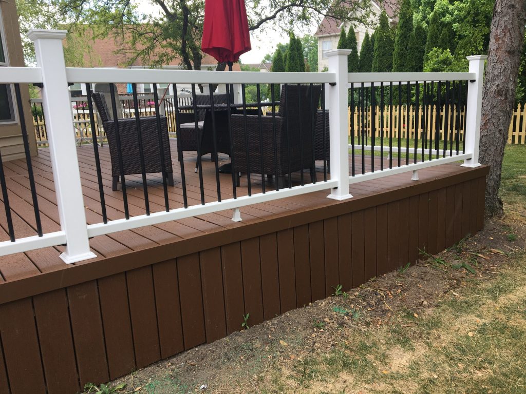 composite deck with vinyl handrailing