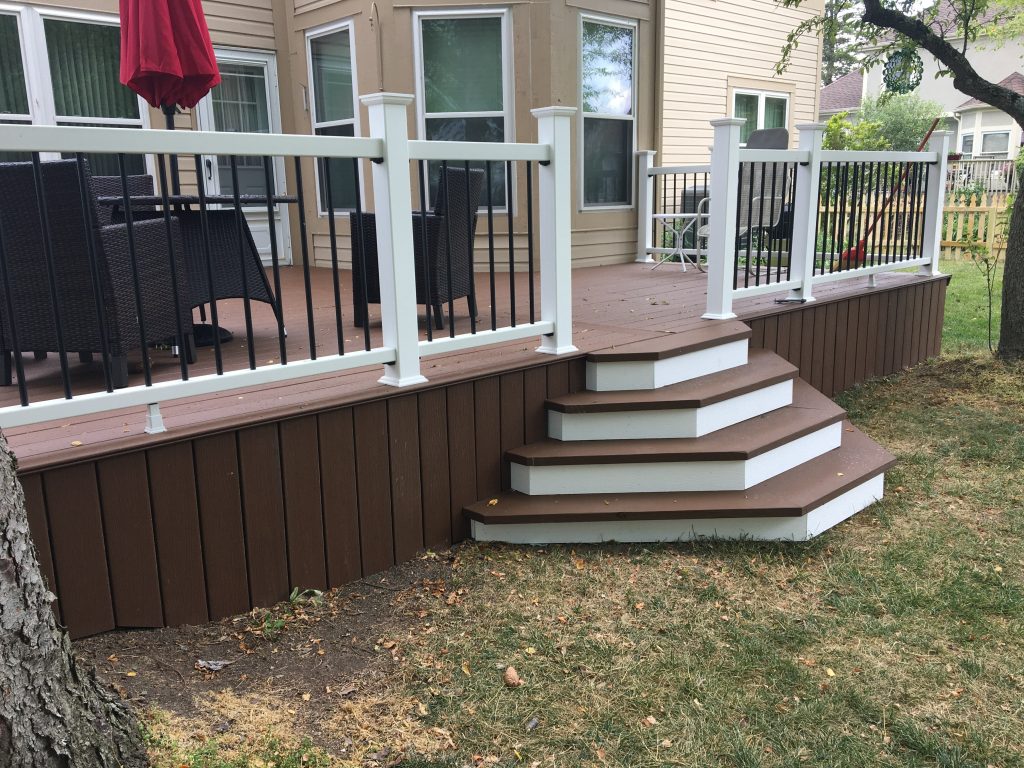 composite deck displaying hexagonal steps and vinyl handrails