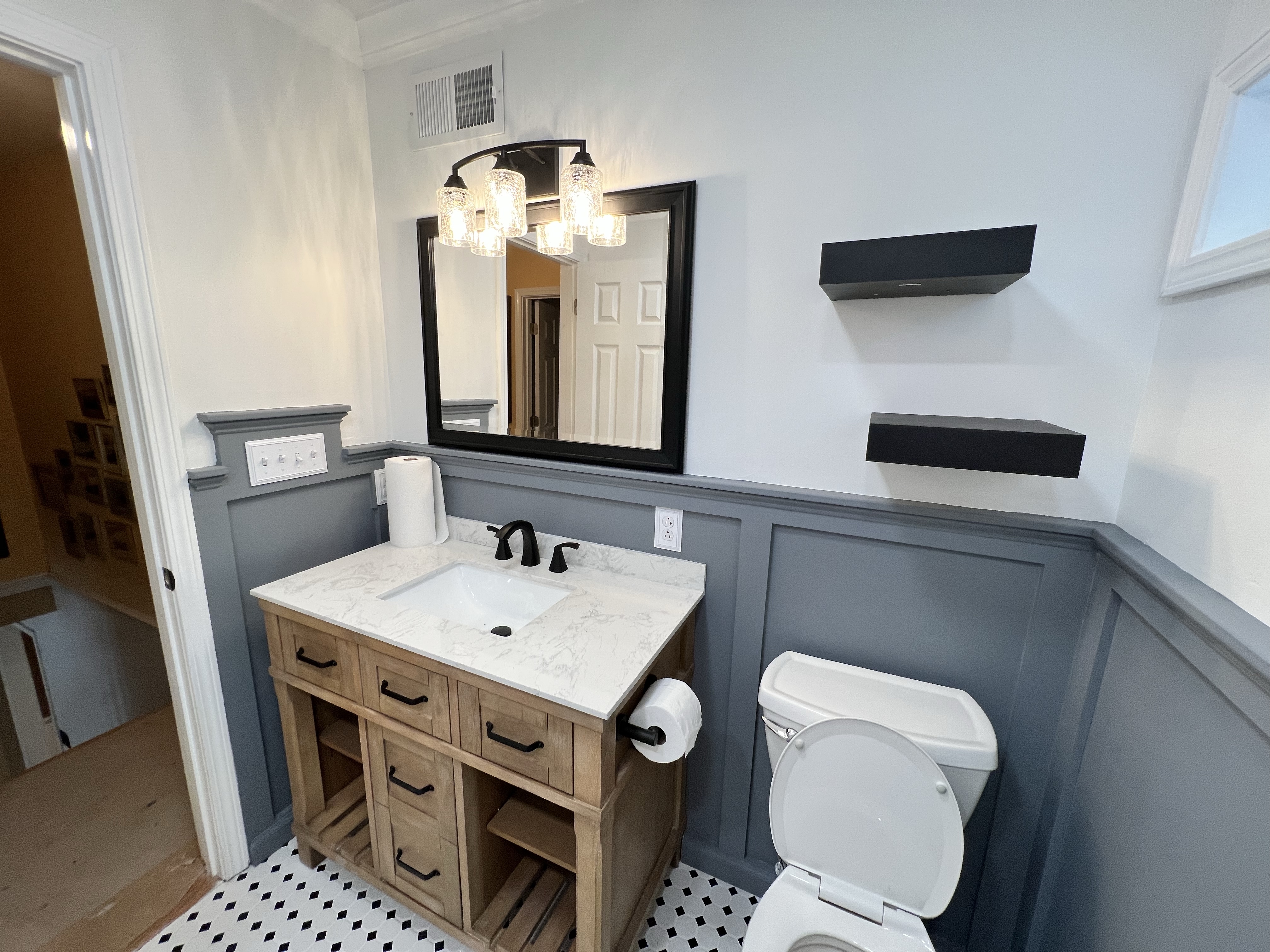 Thompson Parker Builders- Bathroom vanity remodel with wainscoting